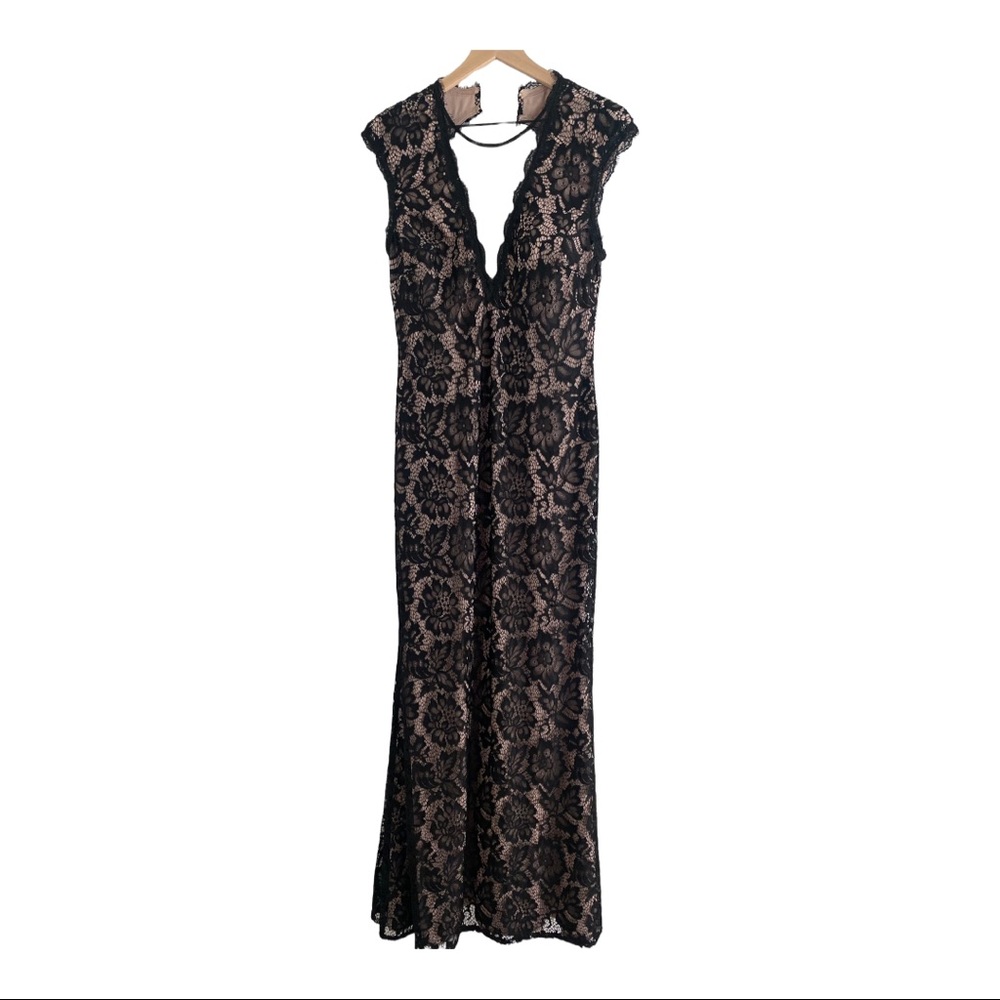 Betsy & Adam Lace Gown with Open Back, Sheer Neckline. Form Fitting.